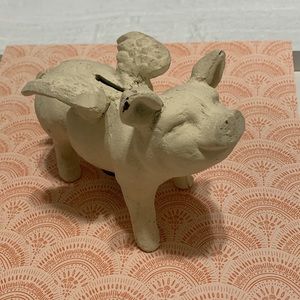 Antique white flying pig metal bank
